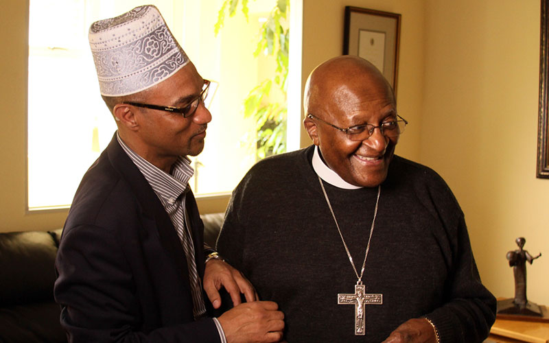Kroc Institute for International Studies professor Rashied Omar in South Africa with Archbishop Desmond Tutu